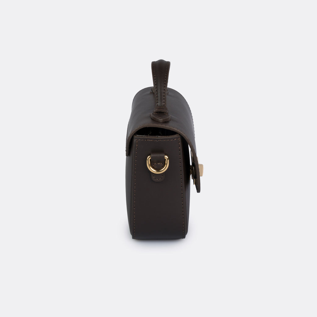 Brown Italian leather top-handle bag with gold-tone hardware, the ARVÉRO Capri