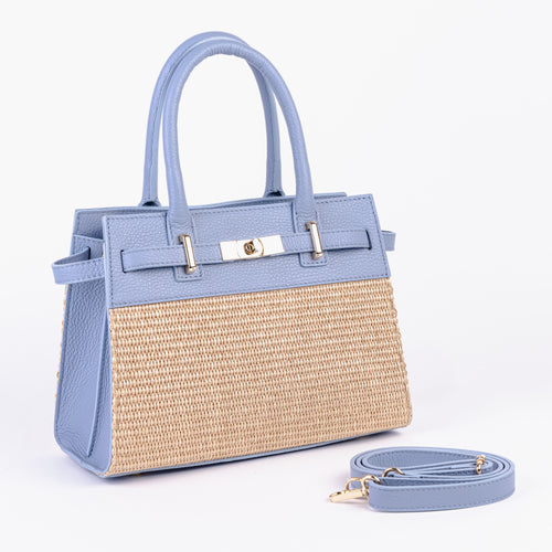 Front view of the Mini Riviera bag showing the woven front and leather details