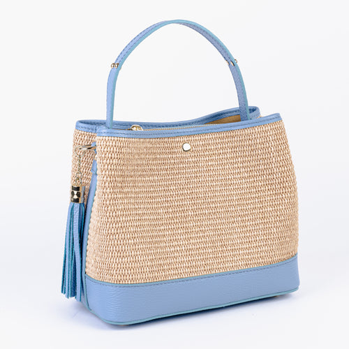 Front view of the Capri tote showing the open tote shape and leather handles