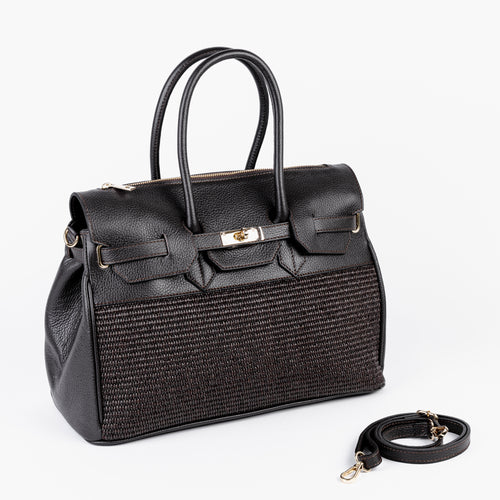 Front view of the Riviera bag showing the structured raffia front and leather top handles